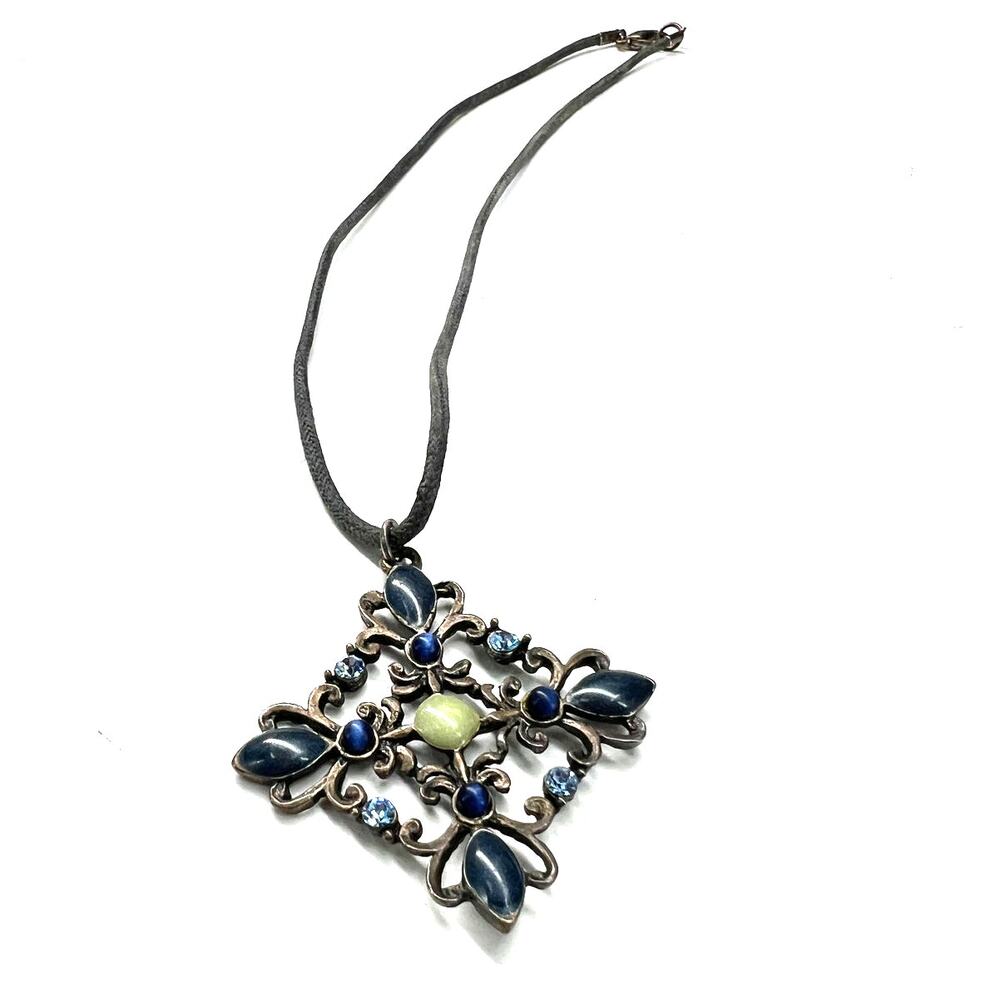 Vintage Worthington Industries necklace filigree pendant blue crystal black cord